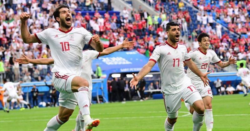 Iran players celebrate