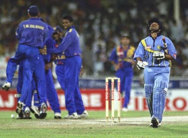 Sachin walks back to the pavilion after being dismissed