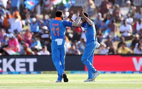 Mohammed Shami and Yuzvendra Chahal celebrate a wicket