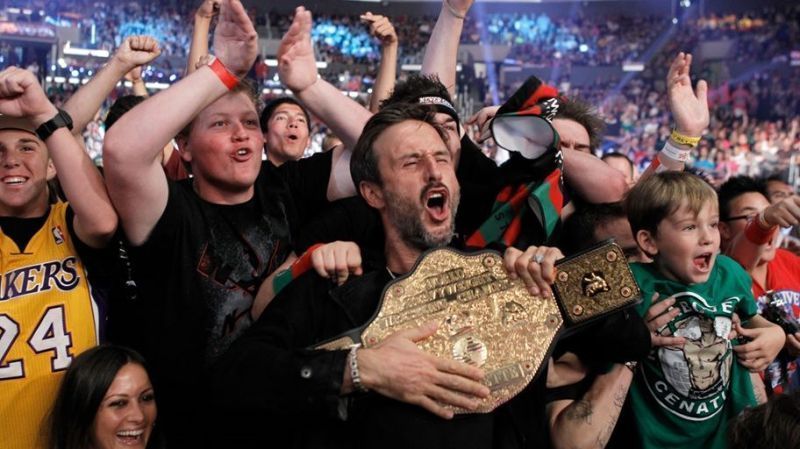 Arquette in the crowd of a WWE show.