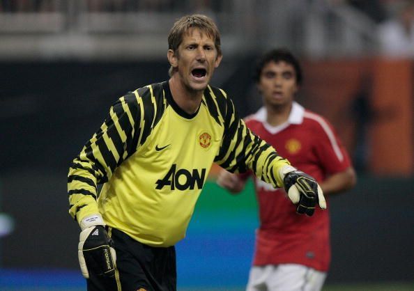 Edwin van der Sar shouts instructions while playing for Manchester United