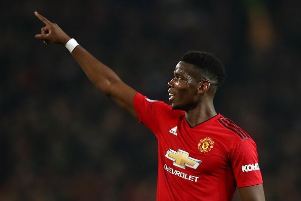 Paul Pogba celebrates after scoring a goal against Huddersfield