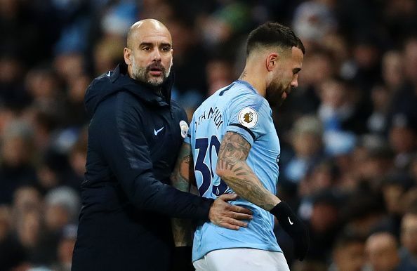 Pep Guardiola and Nicolas Otamendi