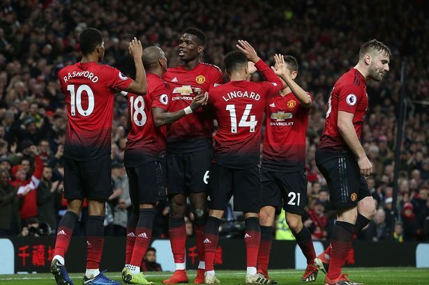 United players celebrate after scoring a goal