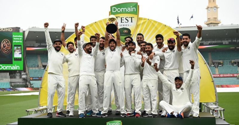 India celebrate their historic win against Australia in Australia