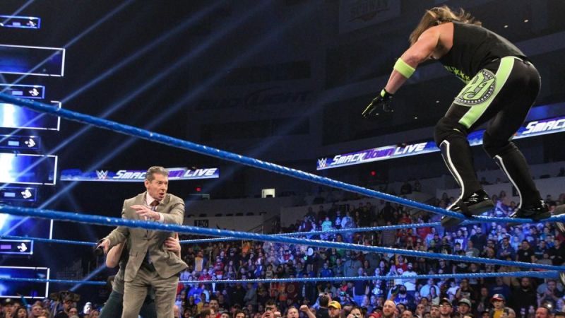 Bryan putting Mr. McMahon in the way!