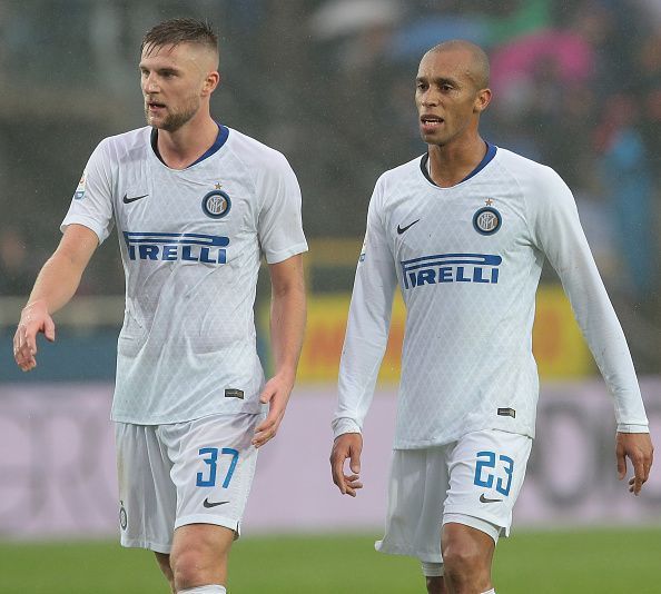 Miranda (l) in action for Inter Milan