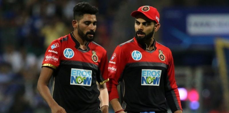 Siraj and Kohli in action for RCB