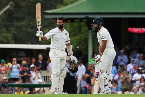 Cheteshwar Pujara celebrates his 100