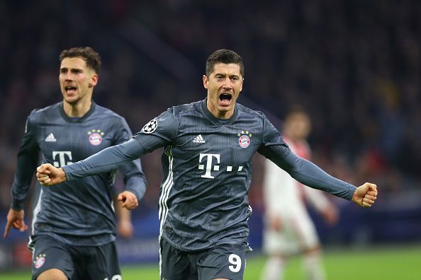 Robert Lewandowski celebrates after scoring against Ajax in the UEFA Champions League Group E matc