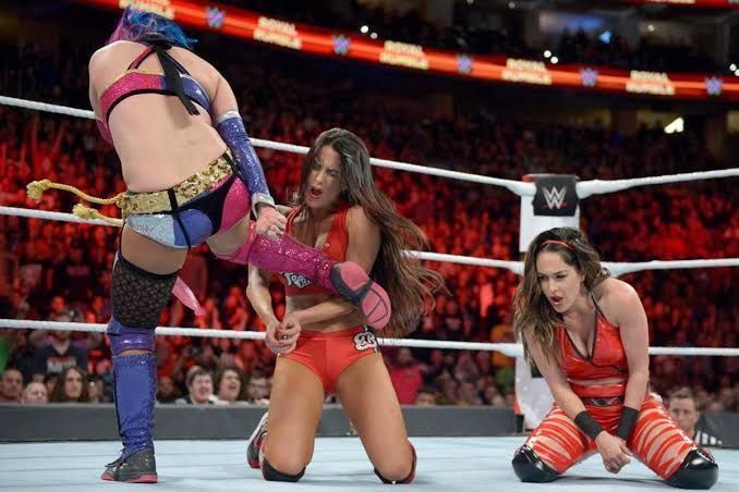 Nikki Bella and Asuka in action