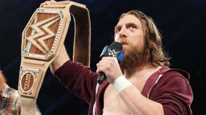 Daniel Bryan hefts his new 'eco-friendly' WWE Championship.