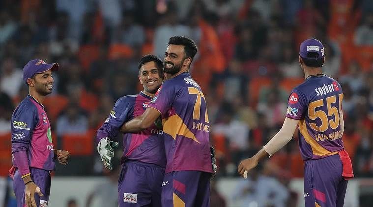 Jaydev Unadkat celebrating with his team-mates after claiming his hat-trick
