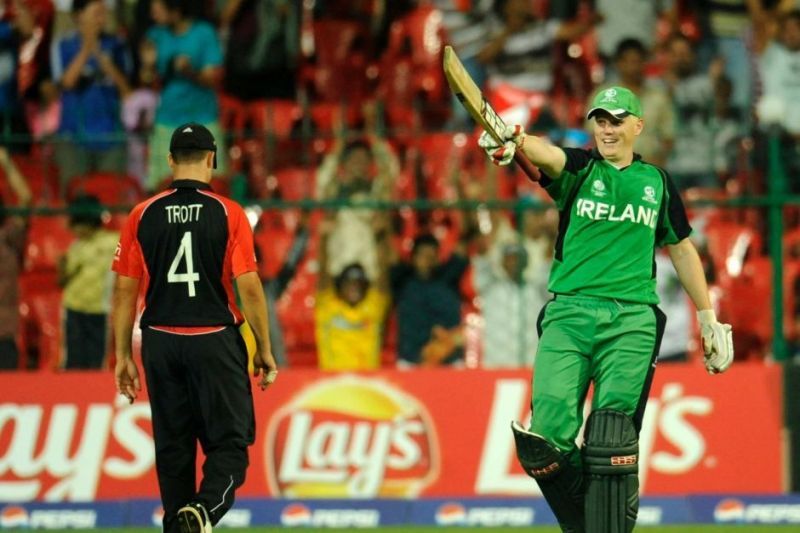 Kevin O&#039;Brien celebrates his century against England.