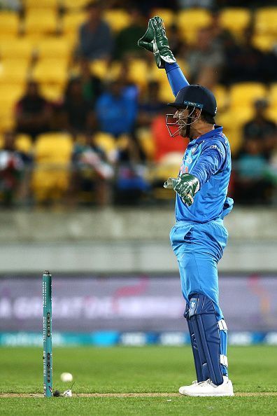 MS Dhoni guiding his team around on the cricket field