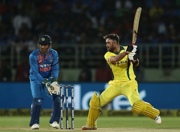 Glenn Maxwell batting as wicketkeeper MS Dhoni watches