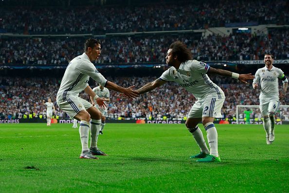 Cristiano Ronaldo and Marcelo doing their iconic celebration