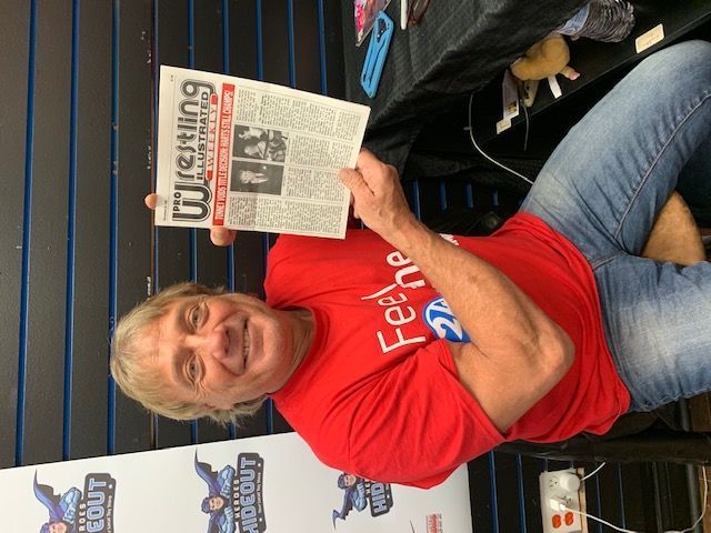 Marty Jannetty Holding Pro Wrestling Illustrated where Jack Tunney give WWF Title's back to The Hart Foundation