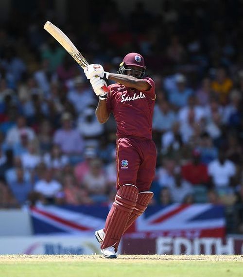 Chris Gayle smashes one through the leg side 