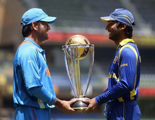 MS Dhoni &amp; Kumar Sangakkara with the World Cup trophy ahead of the 2011 final