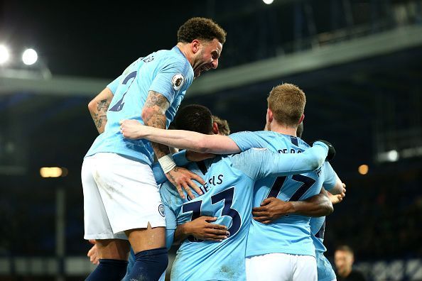 Manchester City players celebrating a goal