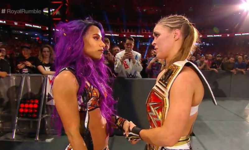 Ronda Rousey consoling Sasha Banks after their match at Royal Rumble 2019