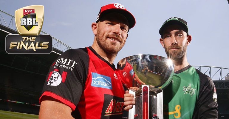 Aaron Finch and Glenn Maxwell pose with the trophy ahead of the final