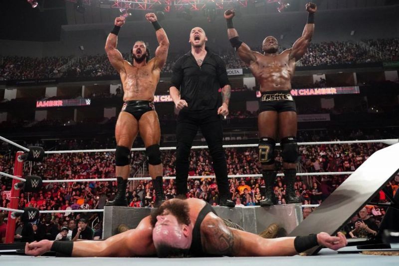 The unofficial team of Drew McIntyre, Baron Corbin, and Bobby Lashley put Braun Strowman through a stack of two tables using the Shield&#039;s signature move - the Triple Powerbomb.