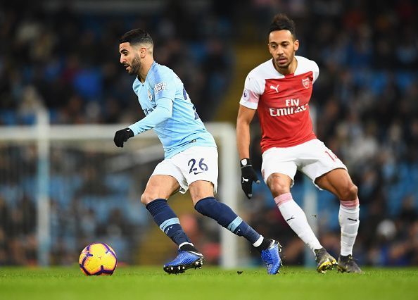 Mahrez and Aubameyang battles for the ball