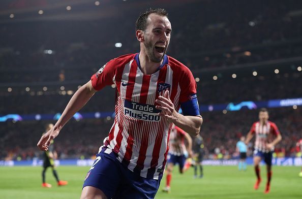 Godin celebrates after scoring a goal against Juventus in the Champions League