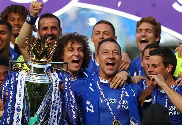 John Terry celebrates an EPL Title with Chelsea.