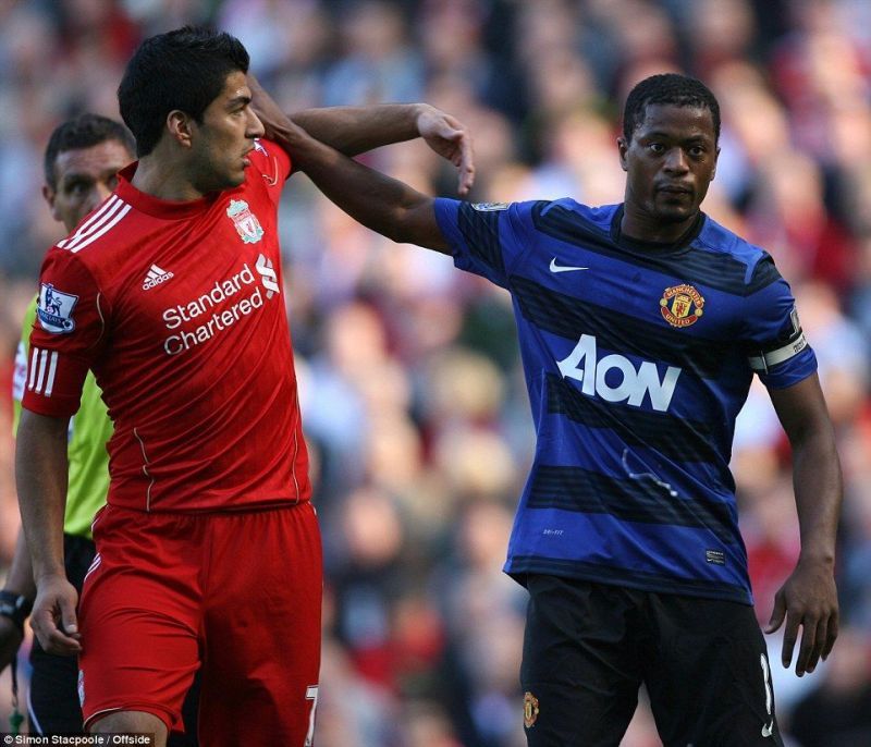 Luis Suarez and Patrice Evra