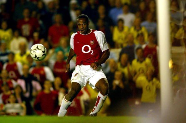 Thiery Henry of Arsenal scores