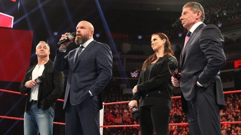 Triple h alongside the rest of the McMahon family