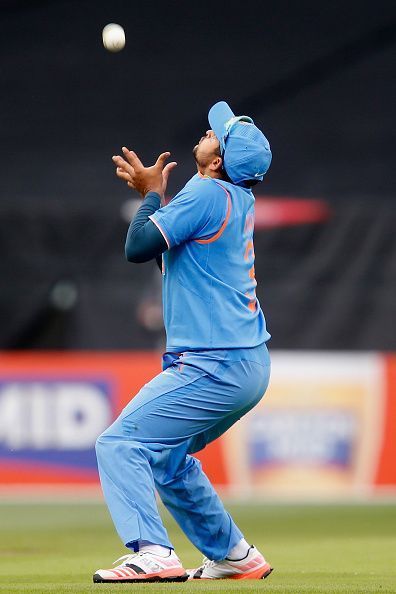 Suresh Raina taking a catch