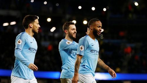 Raheem Sterling celebrating City's sixth goal with David Silva and Bernardo Silva