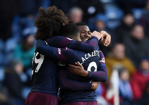 Arsenal scraped past Huddersfield