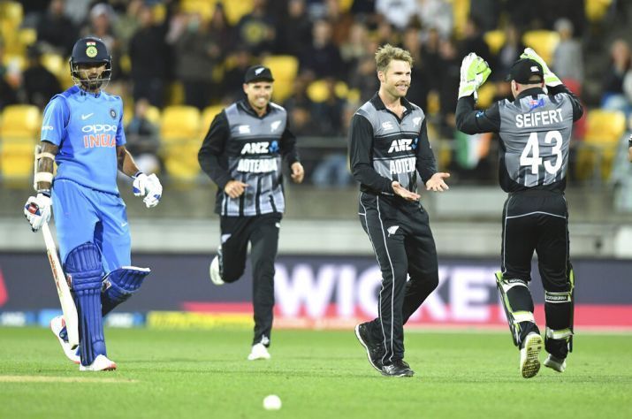 Lockie Ferguson celebrates after dismissing Shikhar Dhawan.