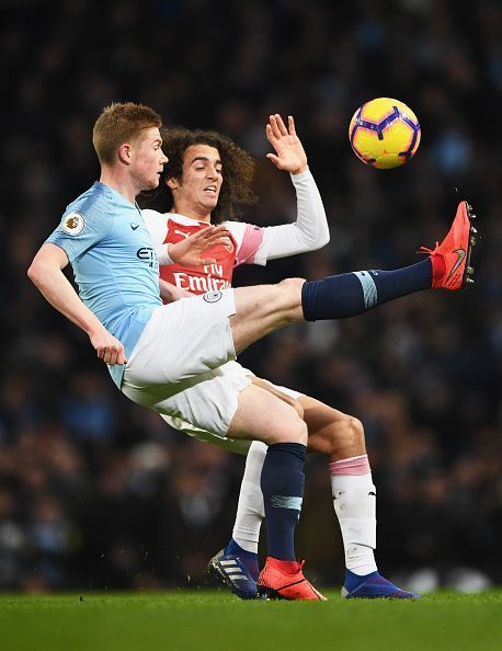 Matteo Guendouzi and KDB battle out for the ball
