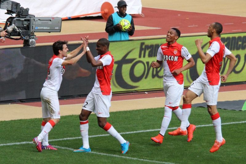 Fabinho and Martial celebrating a goal with their Monaco teammates.
