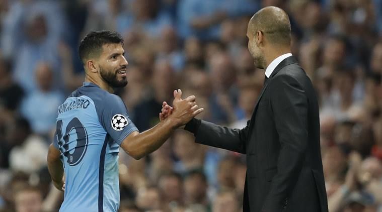 Sergio Kun Aguero (l) and Pep Guardiola (r)