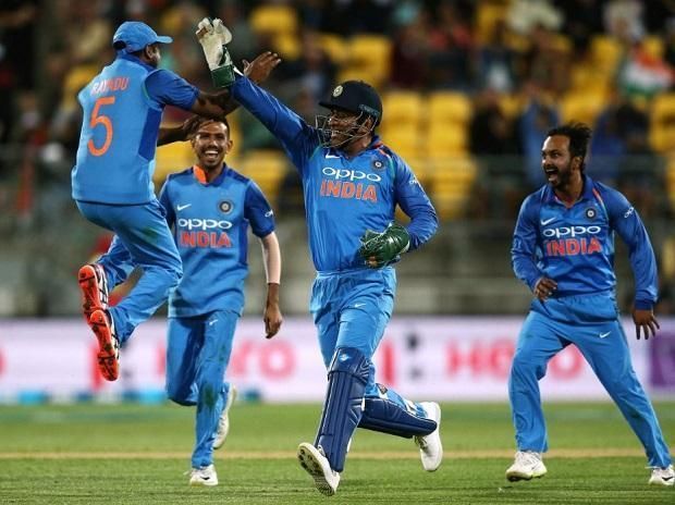 Dhoni celebrates after running out Jimmy Neesham