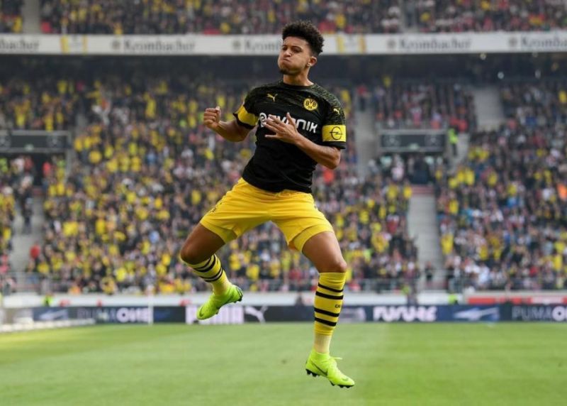 Jadon Sancho celebrating after scoring