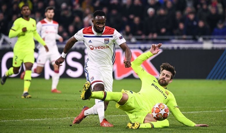Gerard Pique with his last-ditch effort to halt Moussa Dembele a clear path to the goal