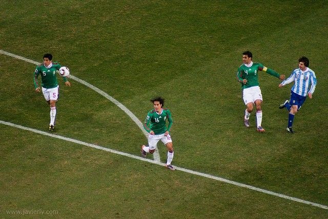 World Cup 2010, Round of 16: Rafa Marquez and his Mexican teammates helplessly follow the ball as Messi attempts a chip. Photograph: Javierly/LaLllama/Flickr