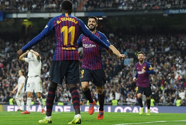 Luis Suarez (c) celebrates with his teammates