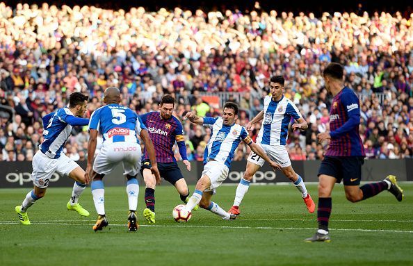 Victor Sanchez with the foul on Lionel Messi just outside the box. The catalyst to the first goal.