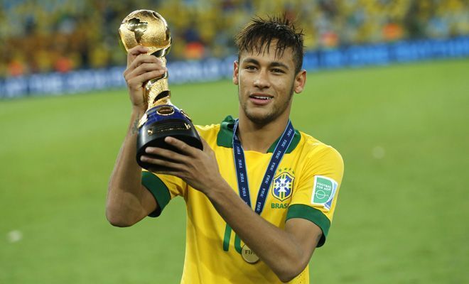 Neymar posing with the 2013 FIFA Confederations Cup