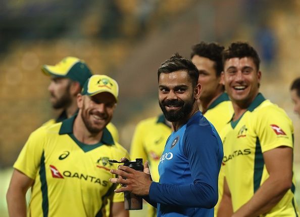 Virat Kohli alongside Australian team