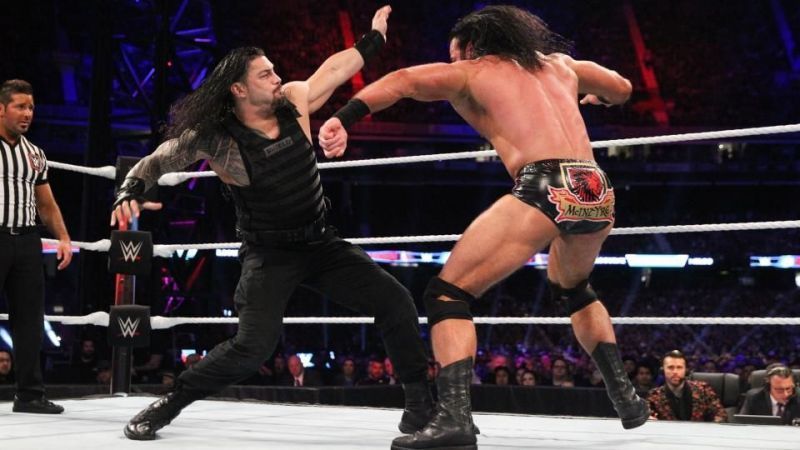 Roman Reigns in action with Drew Mcintyre